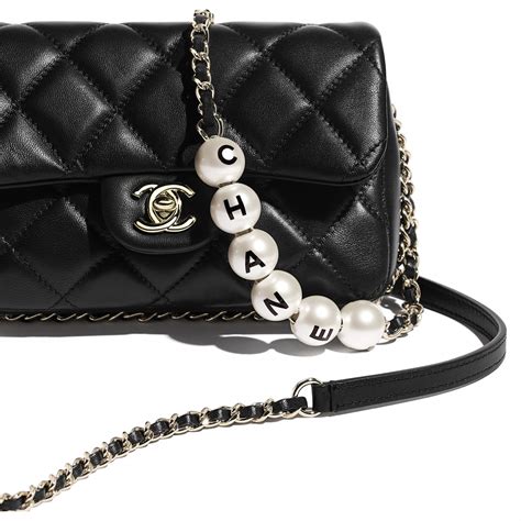 chanel perl bag|chanel bag with pearls strap.